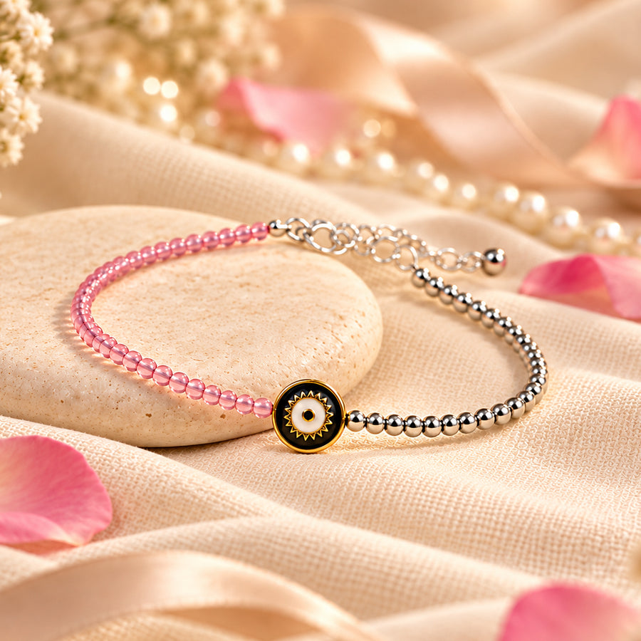 Rose quartz and pyrite anklet with evil eye charm