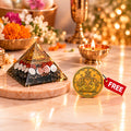 Gomti Chakra Pyramid with pyrite and free coin